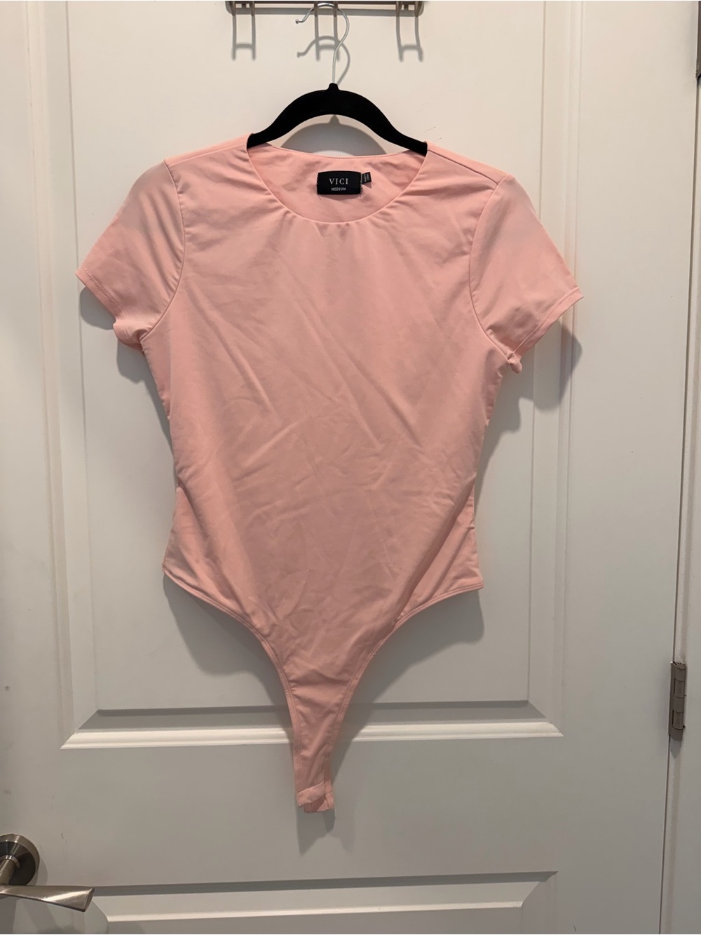 Vici Short Sleeve Bodysuit
Size Medium Pink Crew
Neck Slim Fit